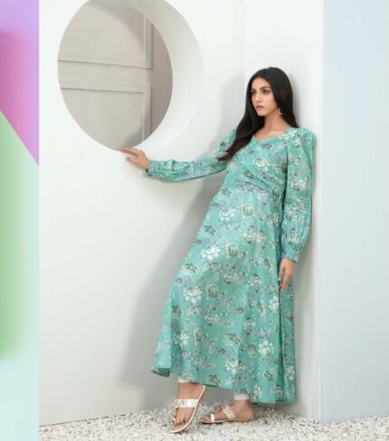 A model wearing a Luminous Green Floral Print Dress, a perfect embodiment of fresh style and floral charm. Elevate your wardrobe with this delightful and comfortable