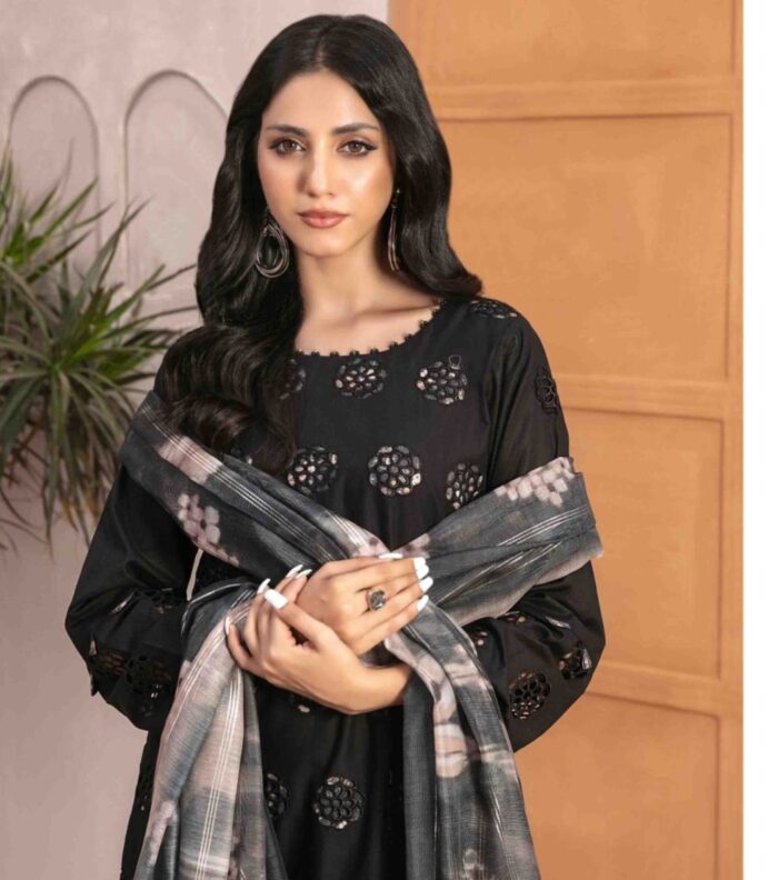 A model wearing a Black Cotton Schiffli Embroidered Fancy Dupatta Dress, showcasing its intricate details and timeless sophistication